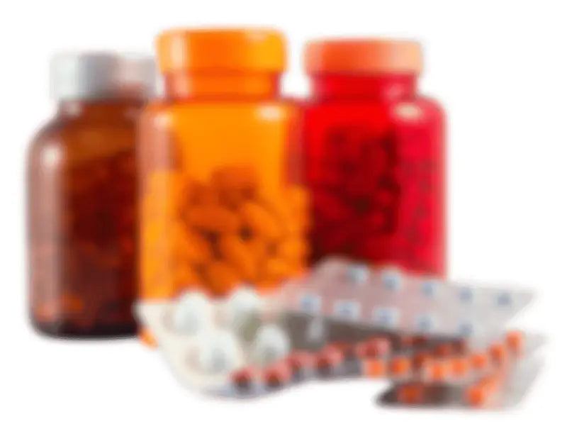Frascos de pastillas y blísteres de suplementos